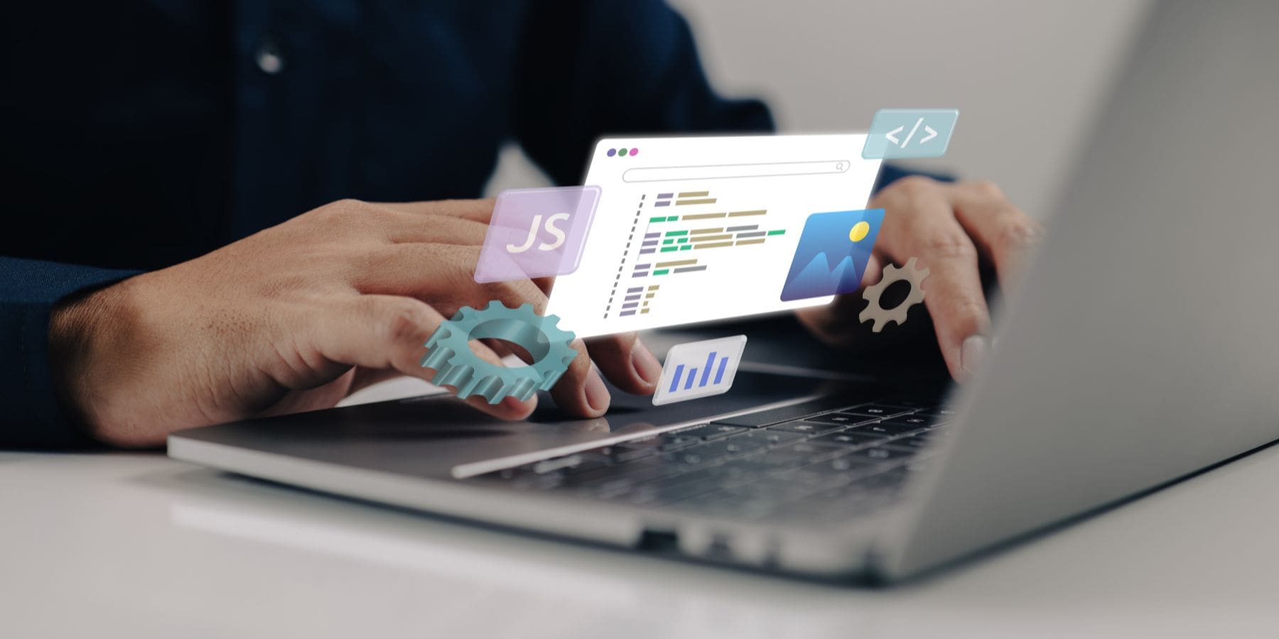 Un ordinateur affichant des outils de création de site internet, entouré d’un espace de travail minimaliste et moderne.